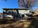 House exterior and backyard with patio at 2326 Union Grove Ct, Lithonia, GA 30058