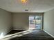Bright, finished basement with sliding glass doors at 2326 Union Grove Ct, Lithonia, GA 30058