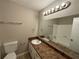 Updated bathroom with new vanity and bathtub at 2326 Union Grove Ct, Lithonia, GA 30058