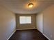 Small bedroom with a window and double door closet at 2326 Union Grove Ct, Lithonia, GA 30058