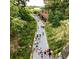 Scenic view of community walking trail with lush greenery and walking distance to shopping and restaurants at 1827 Rockridge Pl, Atlanta, GA 30324