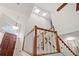 Two-story foyer with stairs, high ceilings, natural light, and a dark wood front door at 1827 Rockridge Pl, Atlanta, GA 30324