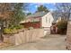 Exterior view of a well-maintained home with a driveway, showcasing its appealing curb appeal at 1827 Rockridge Pl, Atlanta, GA 30324