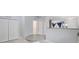 View of the living space showing the laundry area, bathroom, and a partial view of the kitchen at 1450 Riverrock Trl, Riverdale, GA 30296