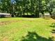 Expansive backyard with green grass and privacy fence, great for outdoor enjoyment at 30 N Cleveland Church Rd, Mcdonough, GA 30253