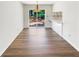 Bright dining area with sliding glass doors to the backyard and hardwood flooring at 30 N Cleveland Church Rd, Mcdonough, GA 30253