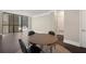 Dining area with hardwood floors and view to living room at 1280 W Peachtree Nw St # 1013, Atlanta, GA 30309