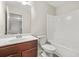 Bathroom featuring a vanity with wood cabinets and tub with shower at 3372 Baylor Cir, Mcdonough, GA 30253