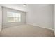 Empty bedroom with neutral carpeting, a window with blinds, and ample natural light at 3372 Baylor Cir, Mcdonough, GA 30253