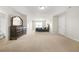 Spacious bedroom featuring neutral paint, plush carpeting, and ensuite bathroom access at 3372 Baylor Cir, Mcdonough, GA 30253
