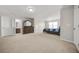 Spacious bedroom featuring neutral paint, plush carpeting, and ensuite bathroom access at 3372 Baylor Cir, Mcdonough, GA 30253
