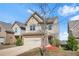 Charming two-story home with a two-car garage, lawn and landscaped front yard at 3372 Baylor Cir, Mcdonough, GA 30253