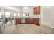 Well-lit kitchen featuring stainless steel appliances, granite counters and a functional layout at 3372 Baylor Cir, Mcdonough, GA 30253