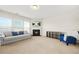 Bright living room with a fireplace, large windows, and comfortable seating at 3372 Baylor Cir, Mcdonough, GA 30253