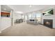 Spacious open-plan living area with a fireplace, dining space, and modern finishes at 3372 Baylor Cir, Mcdonough, GA 30253