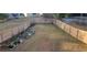 Expansive fenced backyard with garden beds and lawn, providing a private outdoor retreat at 2961 Rolling Ln, Winston, GA 30187