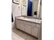 Bathroom with large granite vanity, framed mirror and modern fixtures at 2961 Rolling Ln, Winston, GA 30187