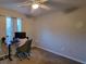 Bedroom features natural light, neutral paint, carpet and a desk at 2961 Rolling Ln, Winston, GA 30187