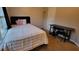 Bedroom featuring plush carpeting, large window, and black study desk at 2961 Rolling Ln, Winston, GA 30187