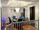 Bright dining room with hardwood floors, modern lighting, and an inviting atmosphere at 2961 Rolling Ln, Winston, GA 30187