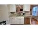 Bright kitchen featuring stainless steel dishwasher, double sink and granite countertops at 2961 Rolling Ln, Winston, GA 30187