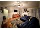 Cozy living room showcasing a fireplace, hardwood floors, and vaulted ceiling at 2961 Rolling Ln, Winston, GA 30187