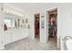 Bathroom boasts double vanity, large closet, and bathtub at 3825 Green Ave, Loganville, GA 30052