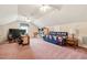 Versatile bonus room includes a workspace and daybed, perfect for guests or hobbies at 3825 Green Ave, Loganville, GA 30052