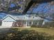 Charming one-story home with mature landscaping and lots of curb appeal at 3825 Green Ave, Loganville, GA 30052