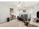 Bright home office features built-in shelving, plush seating, and ample workspace at 3825 Green Ave, Loganville, GA 30052