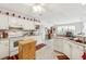 Well-equipped kitchen with white cabinets, ample counter space, and island at 3825 Green Ave, Loganville, GA 30052