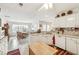 Spacious kitchen with island, ample cabinetry, and dining area at 3825 Green Ave, Loganville, GA 30052