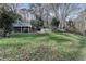 Backyard view featuring a deck and lush green lawn at 3479 Chestnut Dr, Atlanta, GA 30340