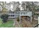 Ranch-style home with an elevated deck and partially finished basement at 3479 Chestnut Dr, Atlanta, GA 30340