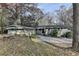 Charming single-story home featuring brick facade and a private driveway with ample parking at 3479 Chestnut Dr, Atlanta, GA 30340