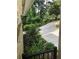 Well-maintained landscaping with a variety of trees, flowers, and a long driveway at 3479 Chestnut Dr, Atlanta, GA 30340