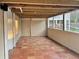 Covered patio area featuring red tile flooring at 3479 Chestnut Dr, Atlanta, GA 30340