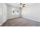 Spacious bedroom with gray walls and carpeting, featuring a ceiling fan at 3562 Ontario Ct, Buford, GA 30519