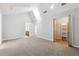 Main bedroom with vaulted ceiling, gray walls, carpet, and walk-in closet at 3562 Ontario Ct, Buford, GA 30519