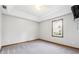 Bright and airy bedroom with neutral walls and carpet flooring at 3562 Ontario Ct, Buford, GA 30519