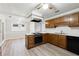 Updated kitchen with wood cabinets, new flooring and stainless steel appliances at 3562 Ontario Ct, Buford, GA 30519