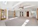 Bright living room with high ceilings, hardwood floors, and lots of natural light at 3562 Ontario Ct, Buford, GA 30519