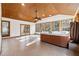 Sunroom with tiled floors, hot tub and access to backyard at 3562 Ontario Ct, Buford, GA 30519