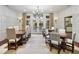 Dining room features a long table with seating for 12, and a view of the outdoors at 1 Brookhaven Ne Dr # 301, Atlanta, GA 30319
