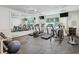 Spacious gym with treadmills, elliptical machines, weights, and mirrors at 1 Brookhaven Ne Dr # 301, Atlanta, GA 30319