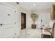 Hallway is well-lit, with an elevator, and decorative wall paneling at 1 Brookhaven Ne Dr # 301, Atlanta, GA 30319