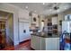 Spacious kitchen boasts ample cabinetry, stainless steel appliances, and center island with dark countertops at 1 Brookhaven Ne Dr # 301, Atlanta, GA 30319