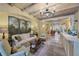 Inviting lobby with stone floors, a reception desk, a large sofa, and an ornate chandelier at 1 Brookhaven Ne Dr # 301, Atlanta, GA 30319