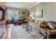 Comfortable home office with hardwood floors, a large window, and plenty of natural light at 1 Brookhaven Ne Dr # 301, Atlanta, GA 30319