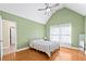Bright bedroom with hardwood floors, neutral walls and large windows at 3420 Aviary Ln, Acworth, GA 30101
